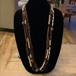 Extra long beaded brown and white necklace